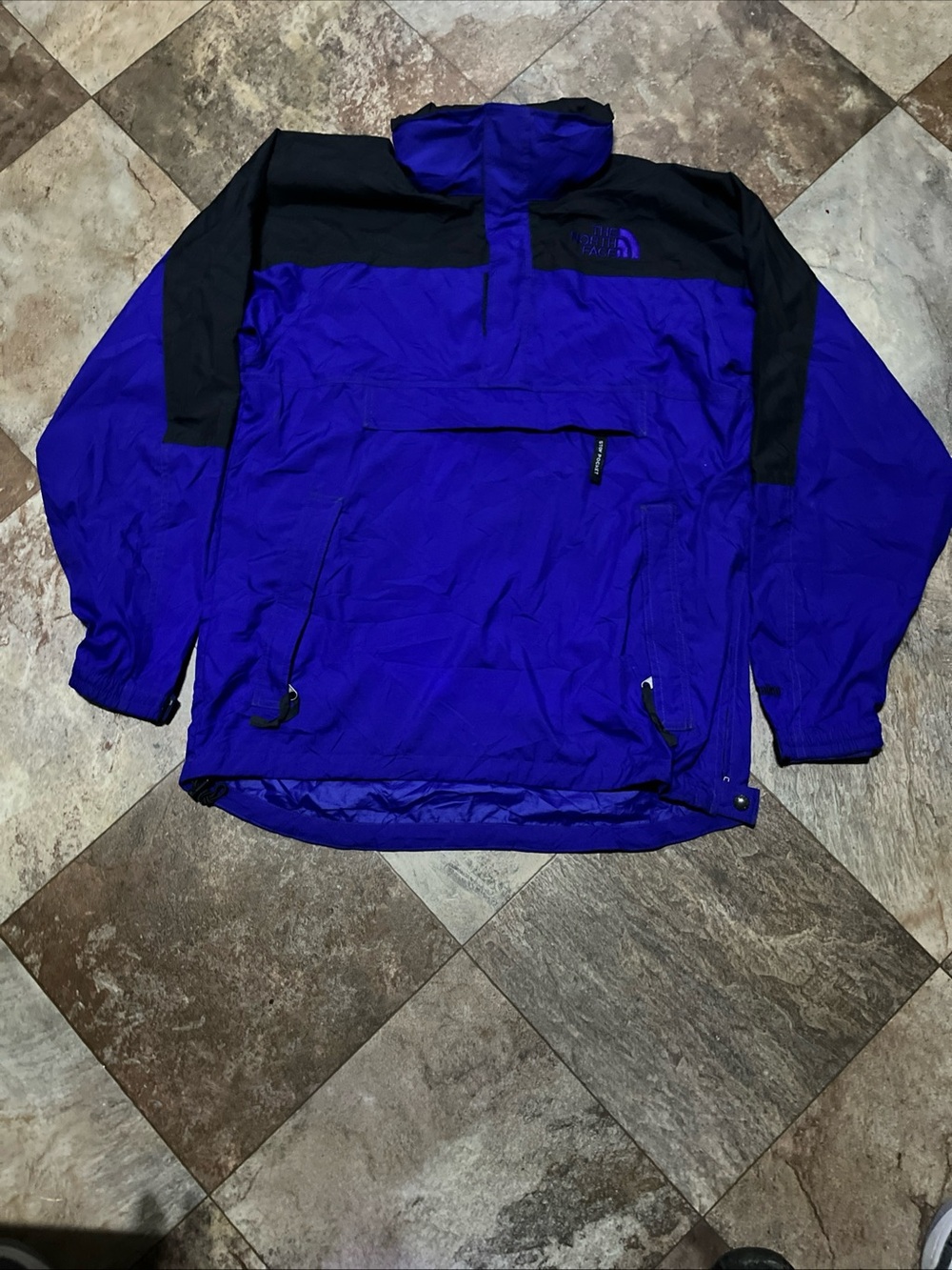The North Face blue and Black Pullover Windbreaker